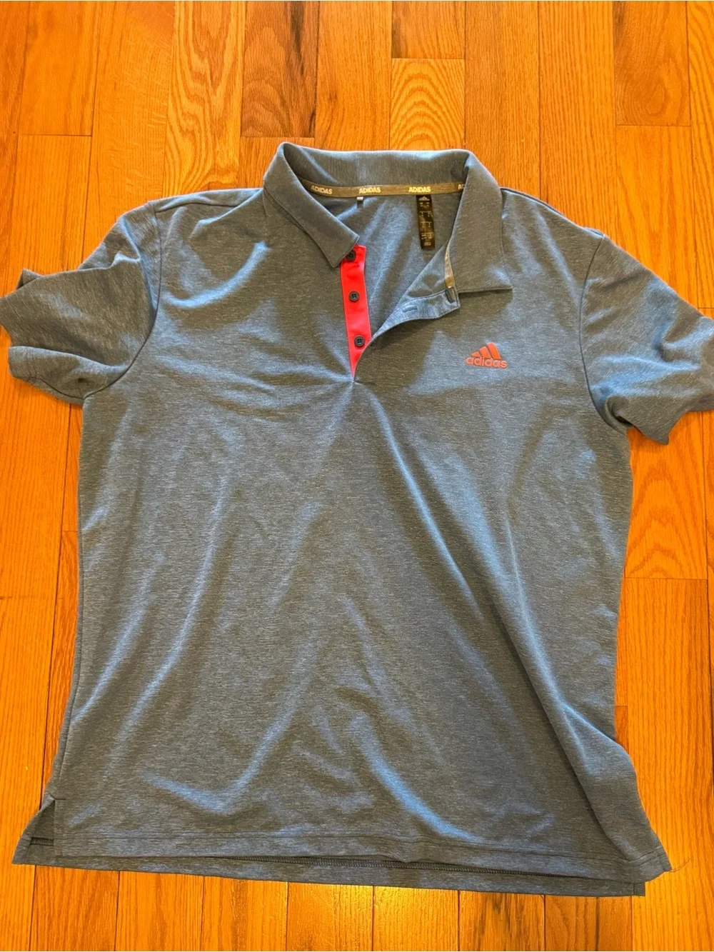 Adidas Men's Blue Polo Shirt with orange/Red Accent